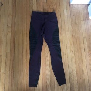 Nike’s dark purple Dri-fit leggings